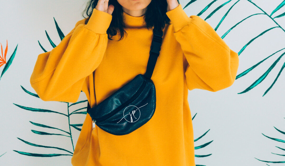 Picture of a woman wearing a fanny pack, one example of an alternative to promotional tote bags
